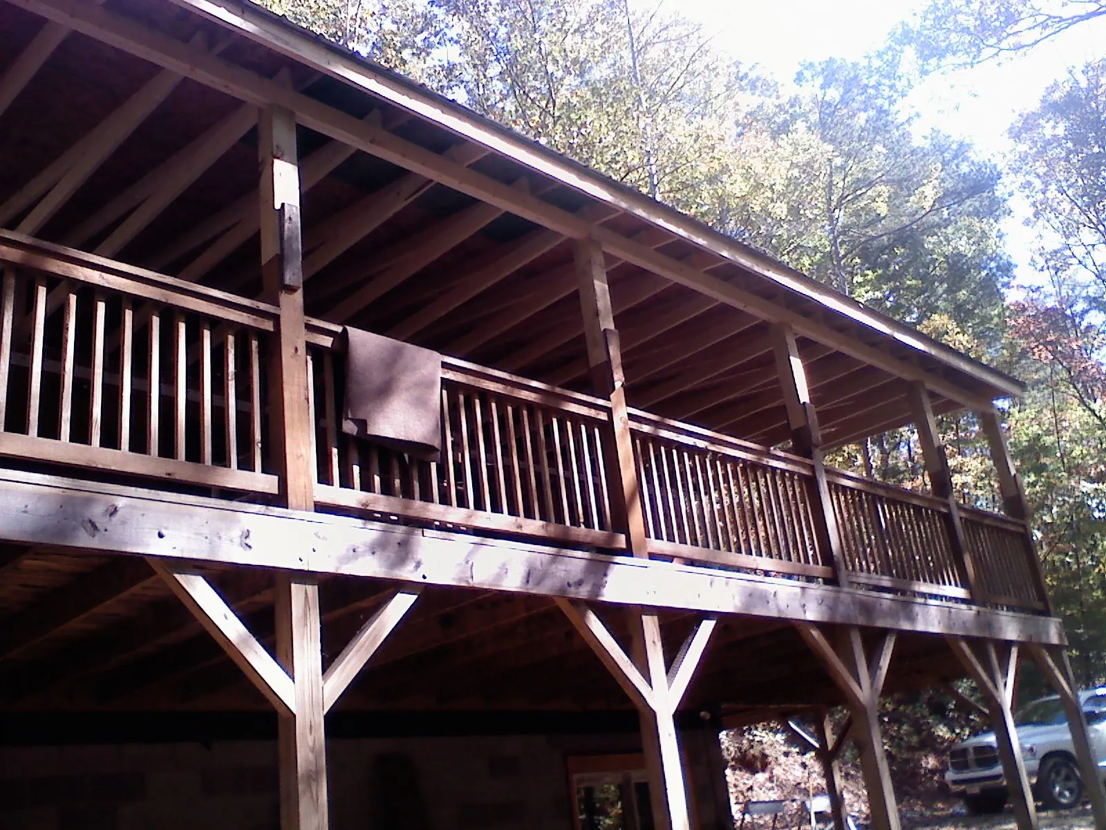 Timber framing under a new elevated porch and deck — Roof Leak Repair in Pleasant Plains by Roofing Brothers